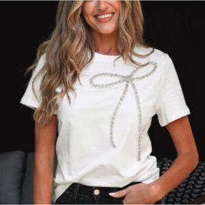 NWT Galita Women’s White Cotton Short Sleeve T Shirt with Rhinestone Bow. Size S